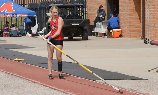 Cloutier sets state record in pole vault; Broncos win home event for third straight meet championship